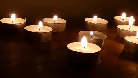 Candle on a black background. black background and blowing candle out.. Stock Footage 105032385