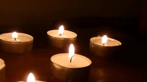 Candle on a black background. black background and blowing candle out Stock Footage 105032446