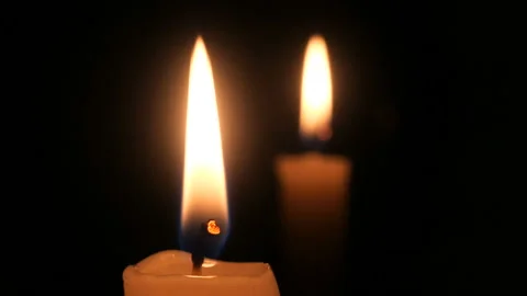 Candle on a black background close-up. Stock Footage 102241966