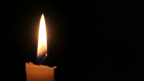 Candle on a black background close-up. Stock Footage 102241969