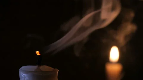Candle on a black background close-up. Stock Footage 102242096