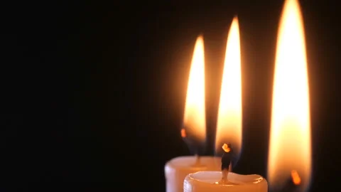 Candle on a black background close-up. Stock Footage 102242182