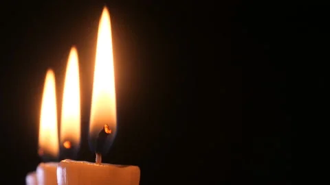 Candle on a black background close-up. Stock Footage 102242188