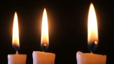 Candle on a black background close-up. Stock Footage 102242256