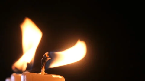 Candle on a black background close-up. Stock Footage 102242284