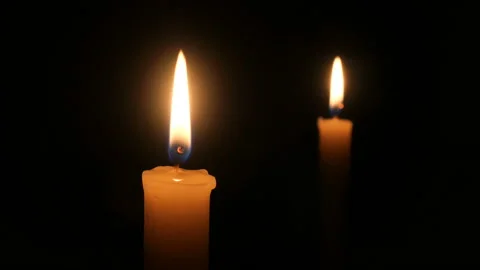 Candle on a black background close-up. Stock Footage 102242365