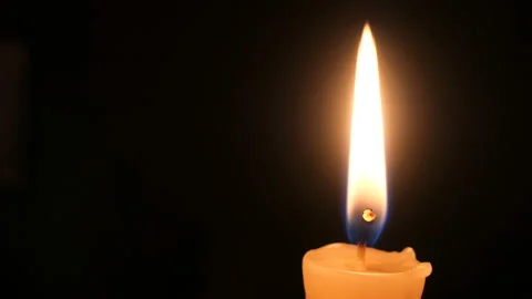 Candle on a black background close-up. Stock Footage 102242475