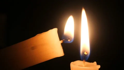 Candle on a black background close-up. Stock Footage 102242518