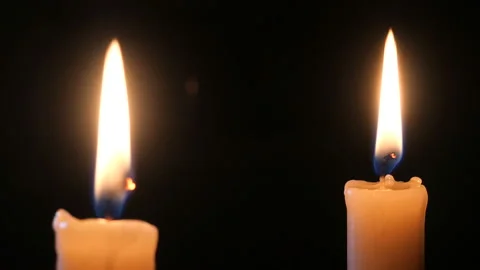 Candle on a black background close-up. Stock Footage 102242906
