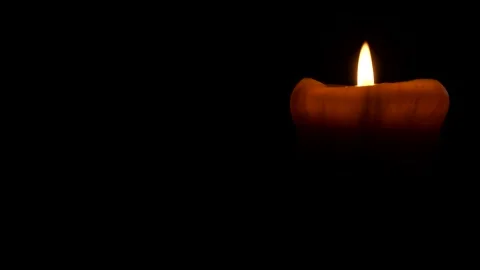 Candle with black background Stock Footage 141361631