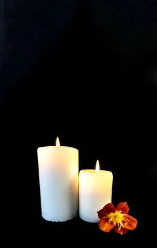 Candle on a black background, postcard, Flat Lai on death and funeral Stock Photos