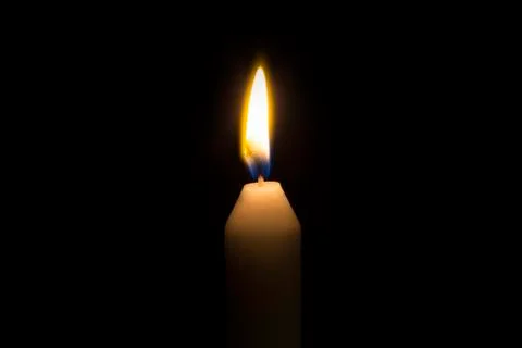 Candle on black Stock Photos