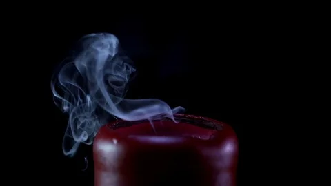 Candle is blown out and creates smoke Stock Footage 123394237