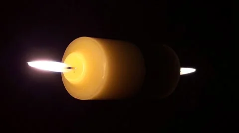 Candle blown out and relight Stock Footage 8662401