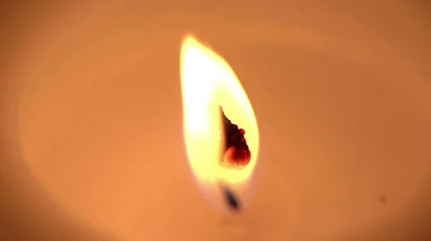 A candle is blown out in slow motion Video stock 34652804