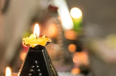 A candle with blurry background Stock Photos
