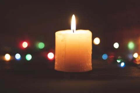 Candle with bokeh in the background Stock Photos