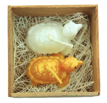 Candle in a box Stock Photos