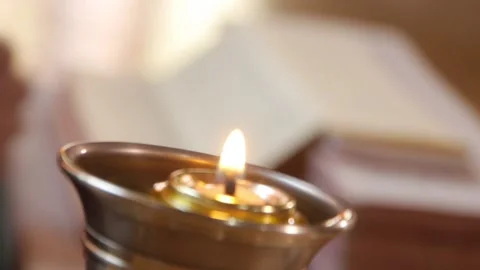 A candle on a Buddhist altar Stock Footage 130223053
