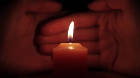 Candle Burning on a background of palm Stock Footage 61755539