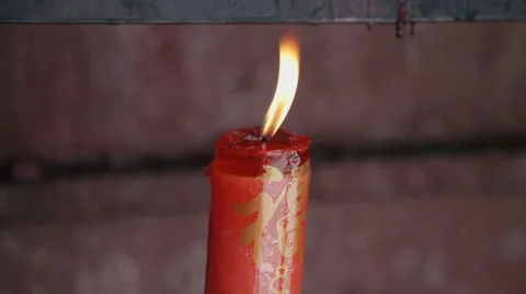 Candle burning at the buddhist temple in Xian, China. Stock Footage 35774820