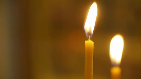 A candle is burning in the candle holder it is dark 01 Stock Footage 117780859