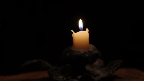 Candle burning in the dark Stock Footage 249174113
