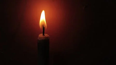 Candle burning in the dark Stock Footage 289448068