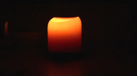 Candle burning in a dark room Video stock 35752904