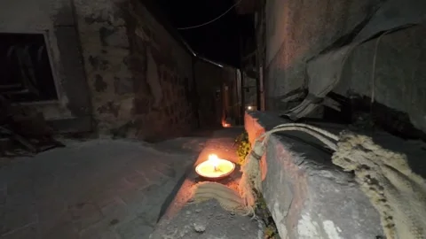 Candle burning in the dark in slow motion Video stock 297556969
