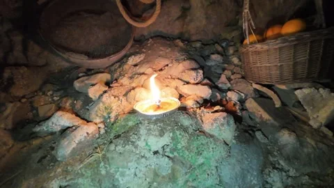 Candle burning in the dark in slow motion Stockbeeldmateriaal 297565387