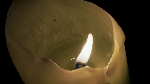 A candle is burning in the dark. The wind's blowing Stock Footage 82409754