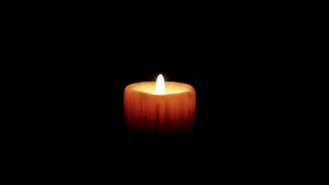 Candle burning in darkness Stock Footage 340960051