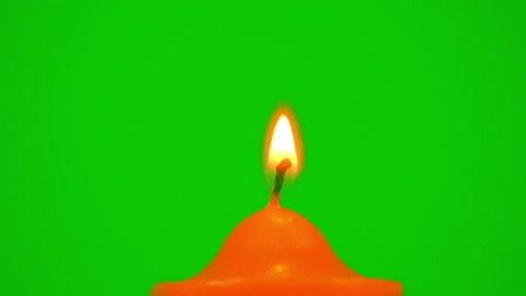 Candle burning on fire flame slow motion on green screen background 動画素材 227933483