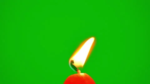 Candle burning on fire flame slow motion on green screen background Stockbeeldmateriaal 227972465