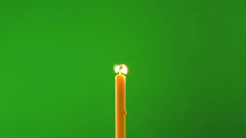 Candle burning fire flame on windy on green screen background of slow motion 動画素材 219572986