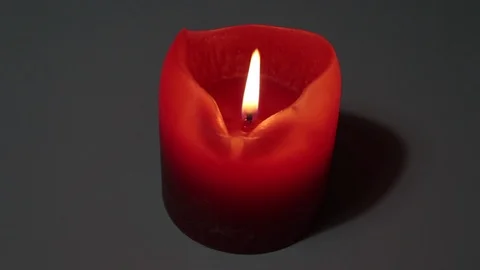 Candle with a burning flame Stock Footage 121329233