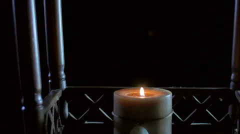 Candle Burning in a Pagoda Slider Stock Footage