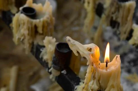Candle burning Stock Photos