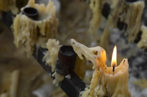 Candle burning Stock Photos