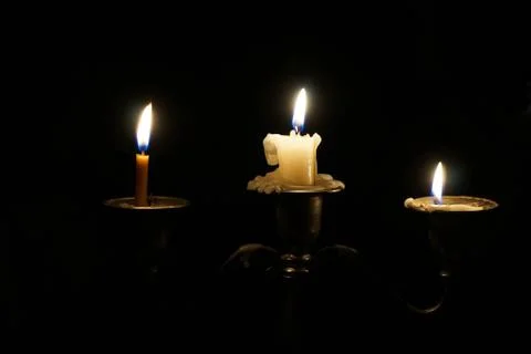 The candle is burning Stock Photos