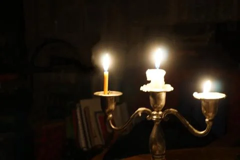 The candle is burning Stock Photos