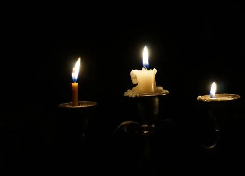 The candle is burning Stock Photos