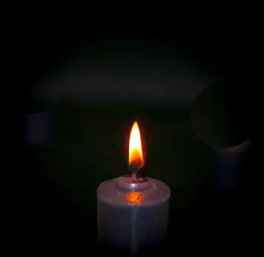 Candle burning Stock Photos