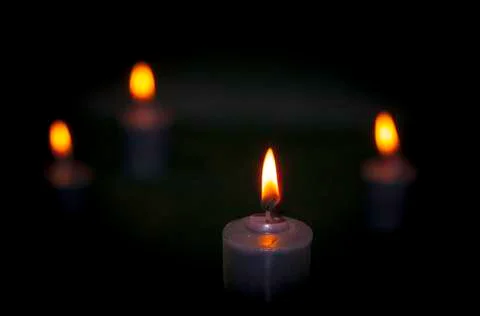 Candle burning Stock Photos