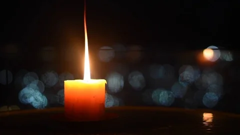 Candle Burns with Bokeh Lights Stock Footage 85233337
