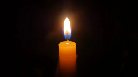 The candle burns with a softly moving flame. Video stock 168467087