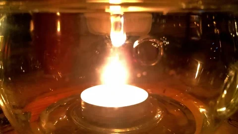 Candle burns on the table Stock Footage 154148302