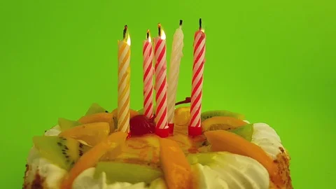 Candle cake on a colored background Stock Footage 121148820