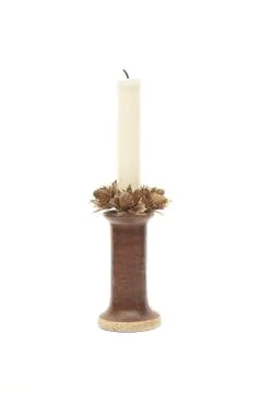 Candle on candlestick Stock Photos